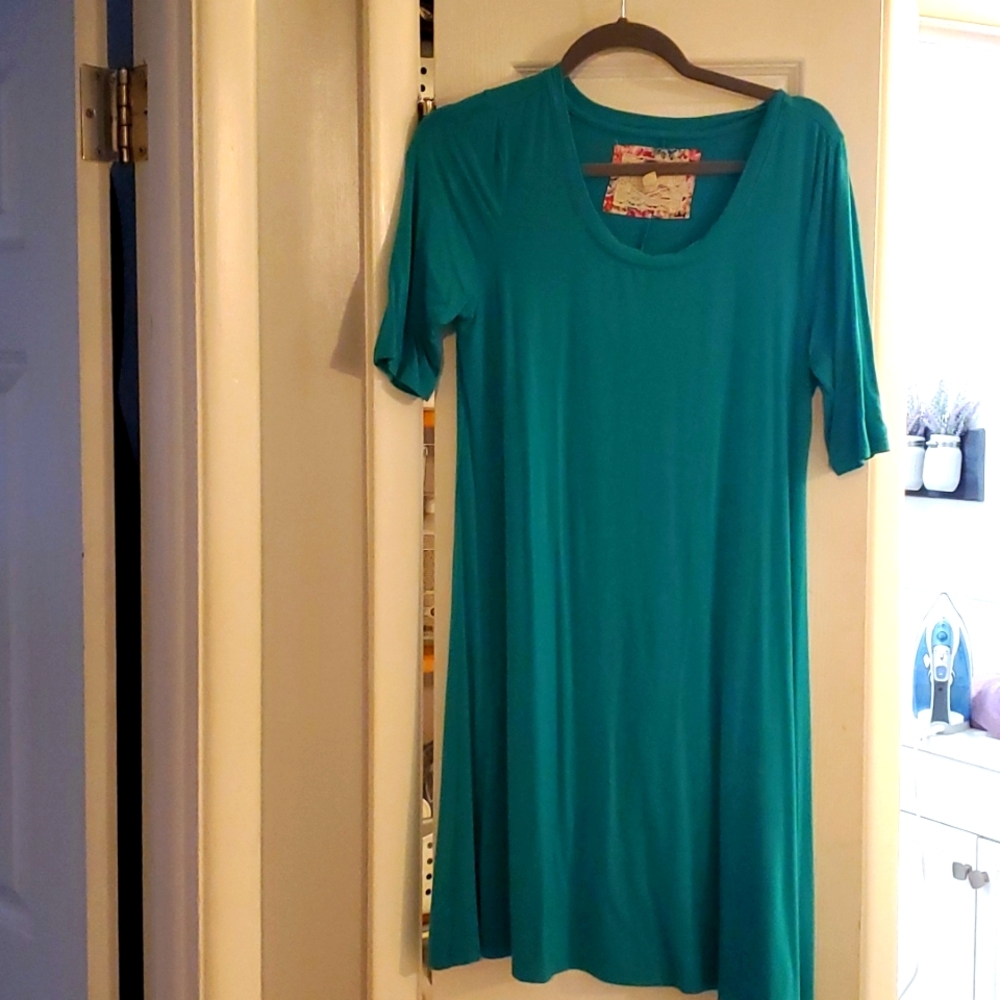Womens turquoise dress sized medium